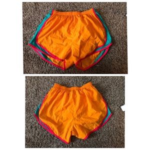 Lightly worn bright orange Nike shorts